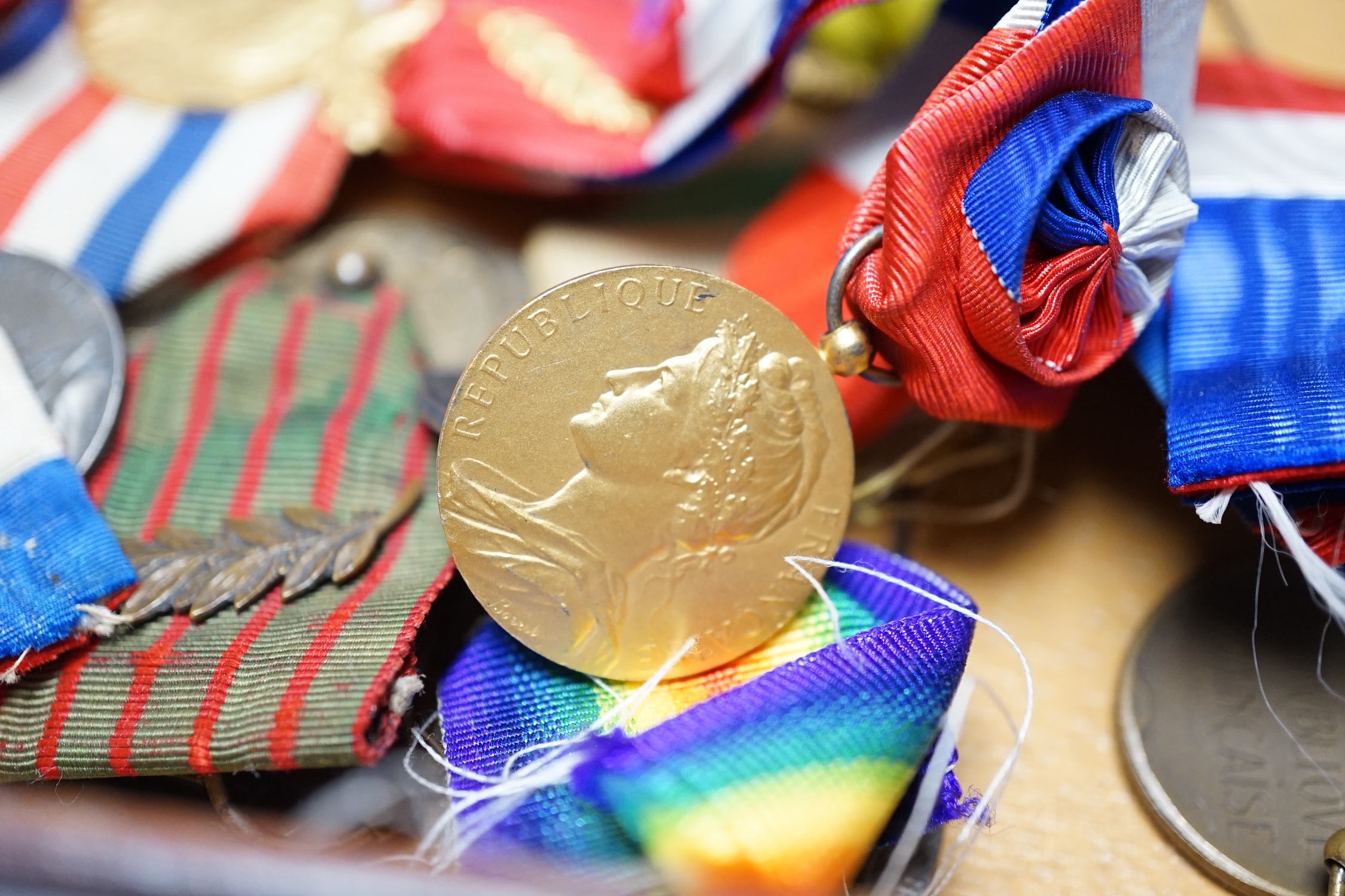 Eighteen French and Belgium medals, etc. including; Medal of Honour, War Cross, Medal of Honour for Physical Education, Victory Medal, etc.